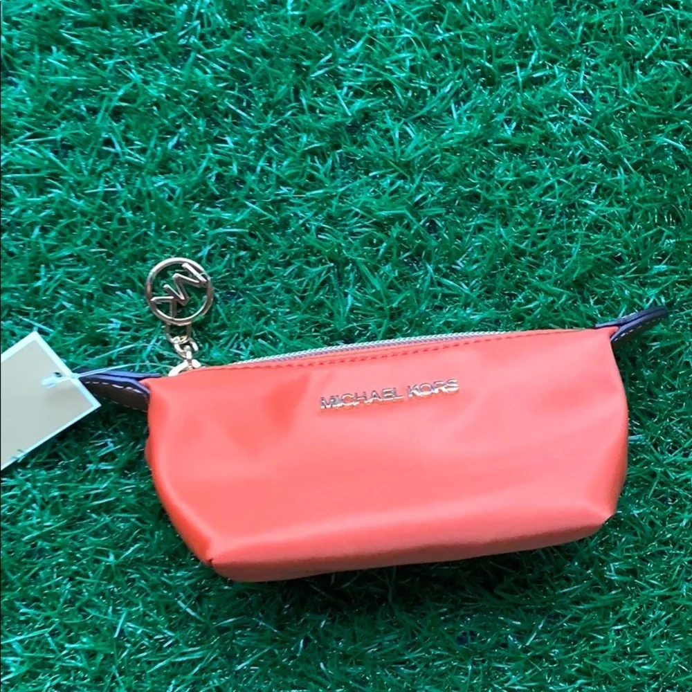 MICHAEL KORS TRAVEL XS POUCH TANGERINE - Picture 11 of 16